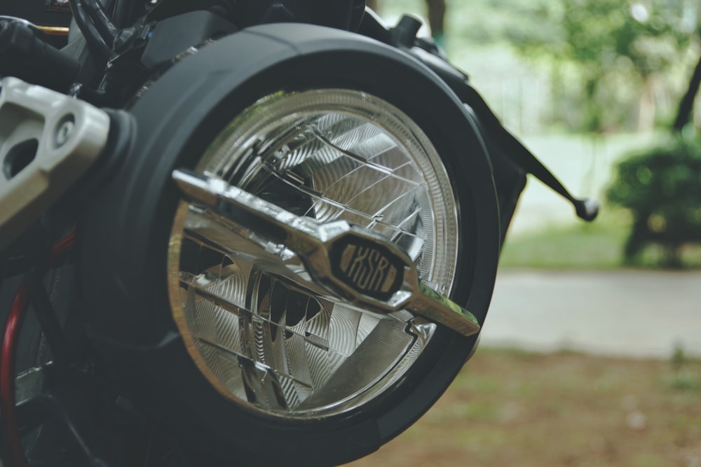 a close up of a motorcycle's front wheel