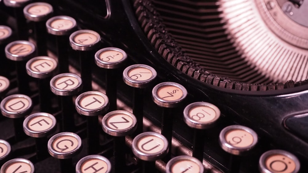 a close up of an old fashioned typewriter