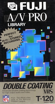 A vintage Fuji A/V PRO Library VHS tape cover features a colorful abstract design with overlapping rectangles in blue, green, and yellow tones, set against a black background. The text highlights the product's suitability for high-fidelity stereo recording with double coating technology.