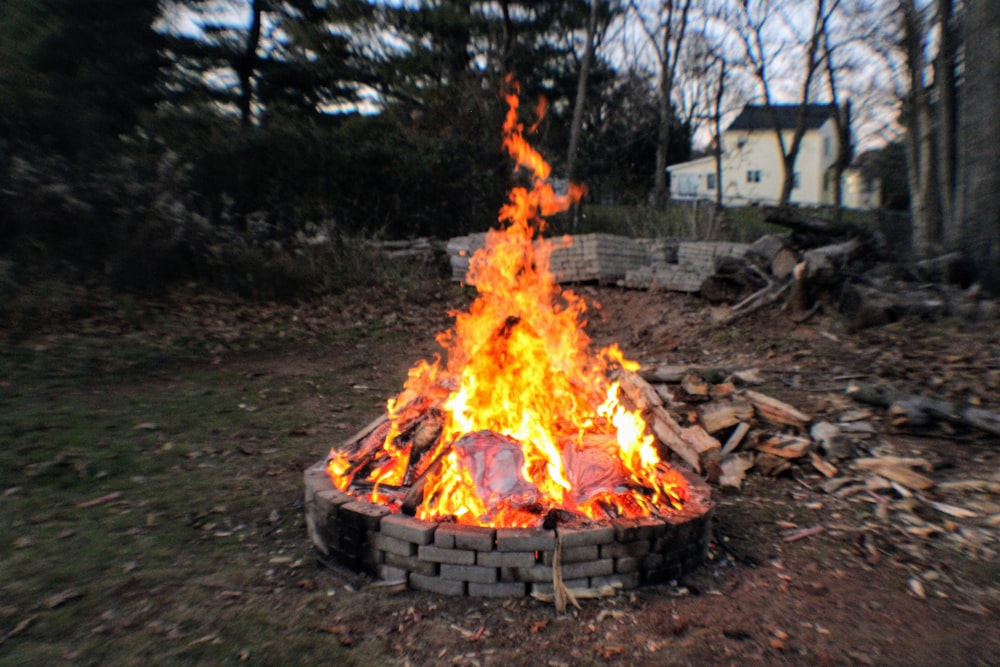 a fire pit in the middle of a field