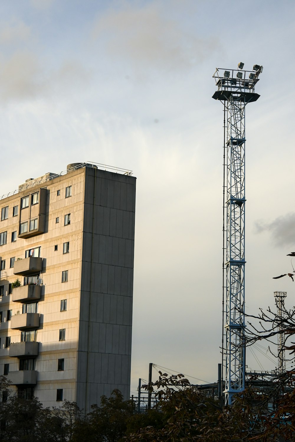 a tall tower next to a tall building