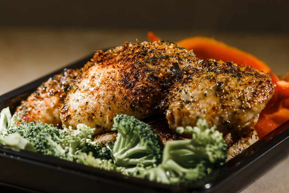 a close up of a plate of food with broccoli