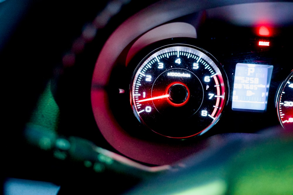 a close up of a speedometer in a car