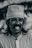 Portrait of an Indian man smiling confidently, wearing a natural-looking wig from toshmi.