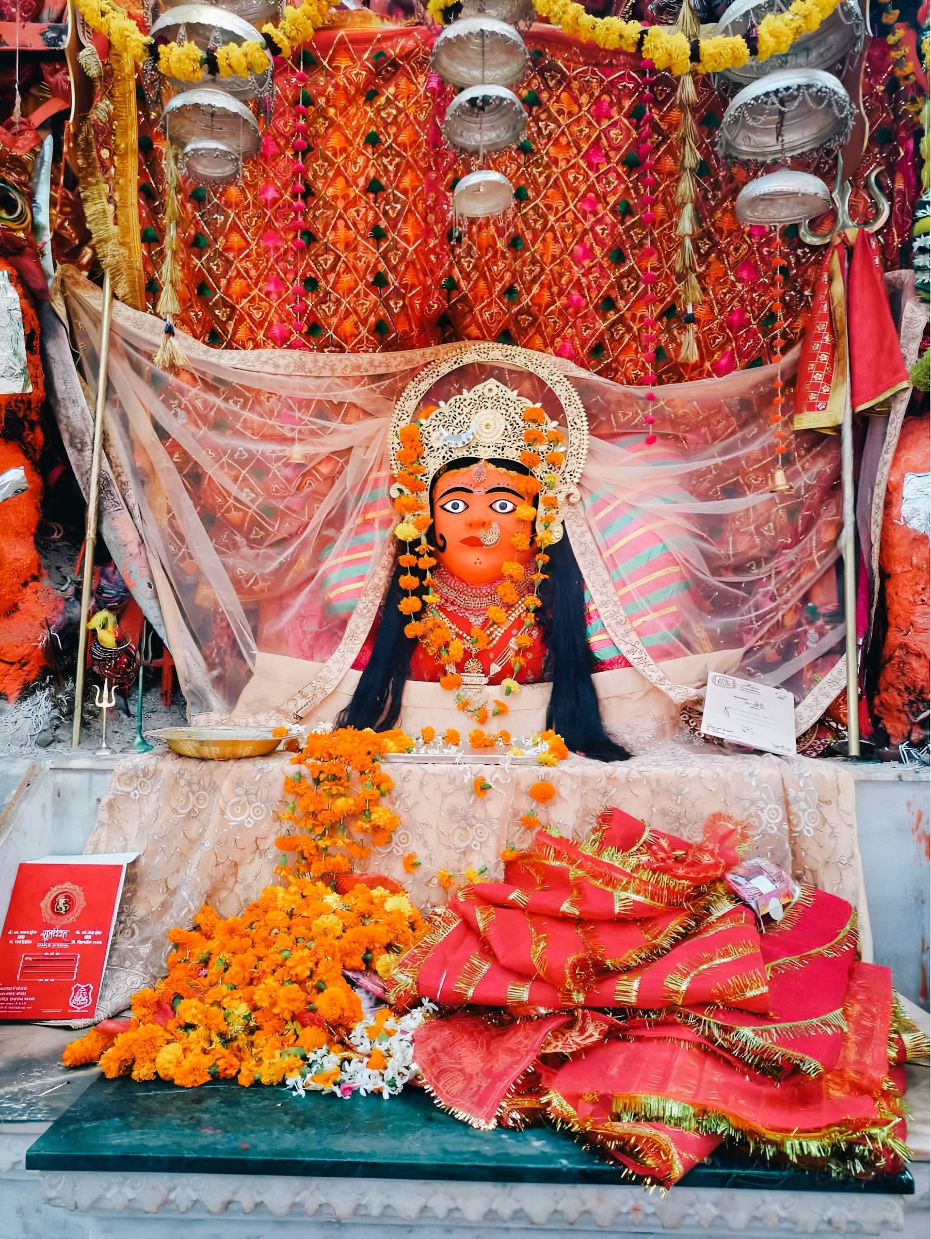 woman wearing yellow long-sleeved dress under white clouds and blue sky during daytime