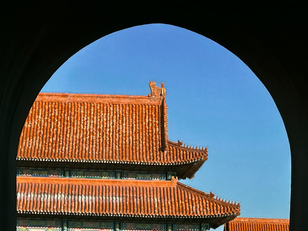 a view of a building through an archway