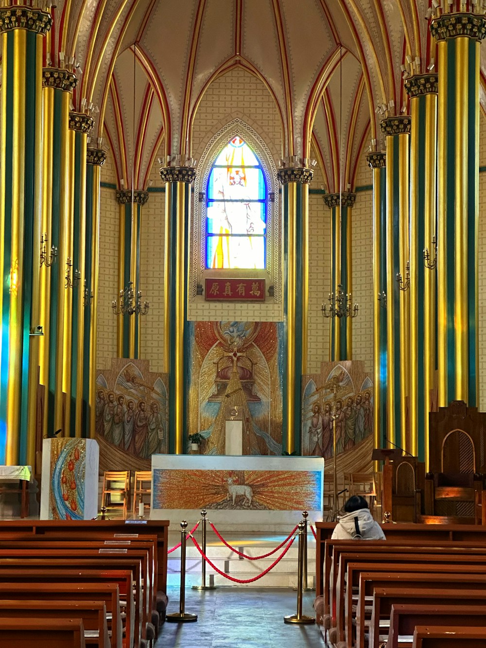 the interior of a church with stained glass windows