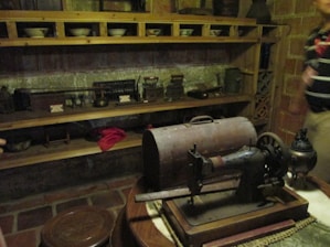 Flour and sewing machines set up in a rural home, ready for use.