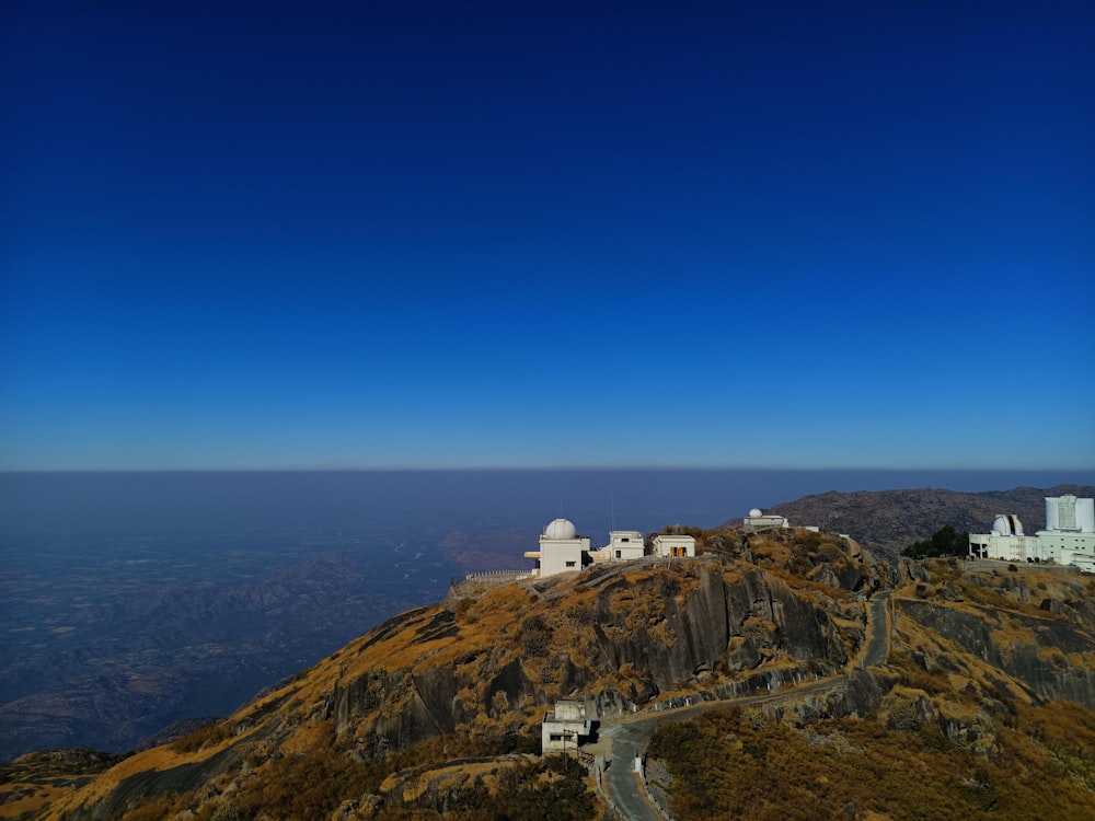 a view of a mountain with a road going up it