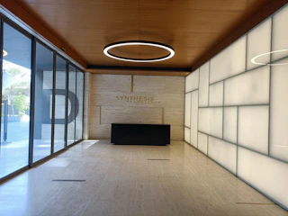 A sleek office interior with teal and gold accents reflecting Skyfield's professional corporate identity.