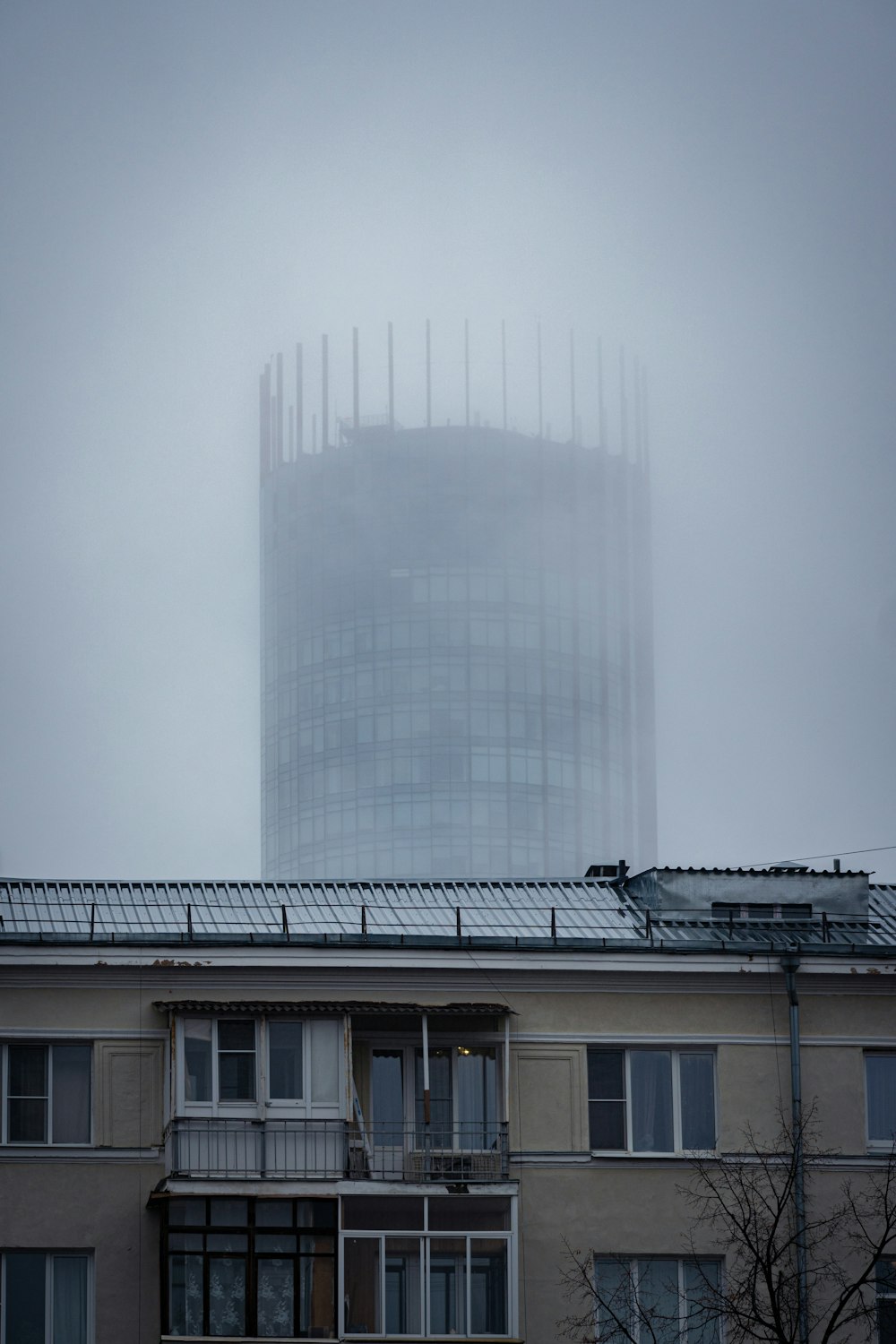 a tall building with a lot of windows on top of it