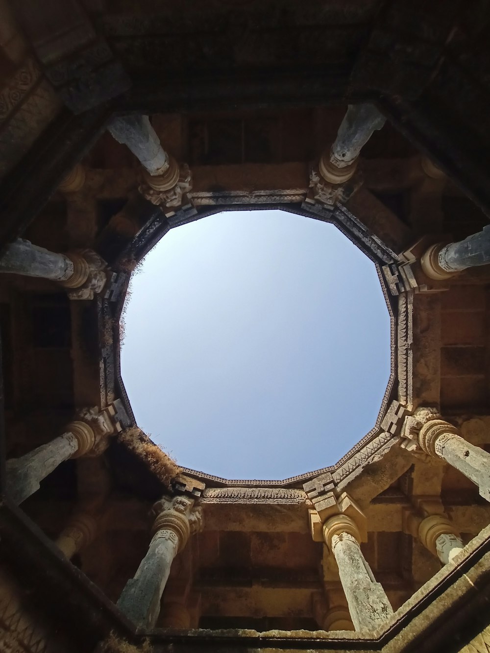 a view of the sky through a round window