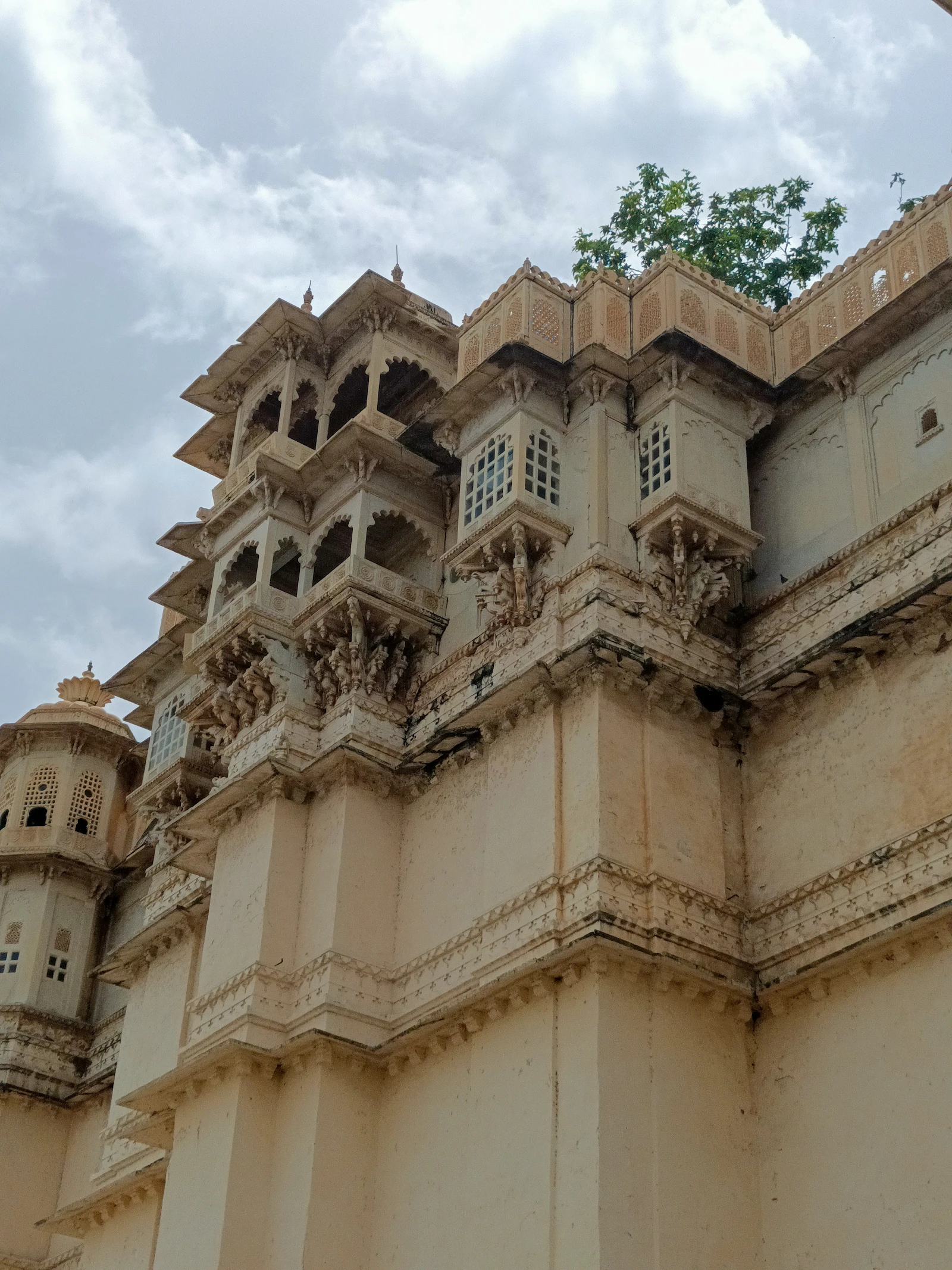 City Palace of Udaipur reflected in Lake Pichola, Rajasthan