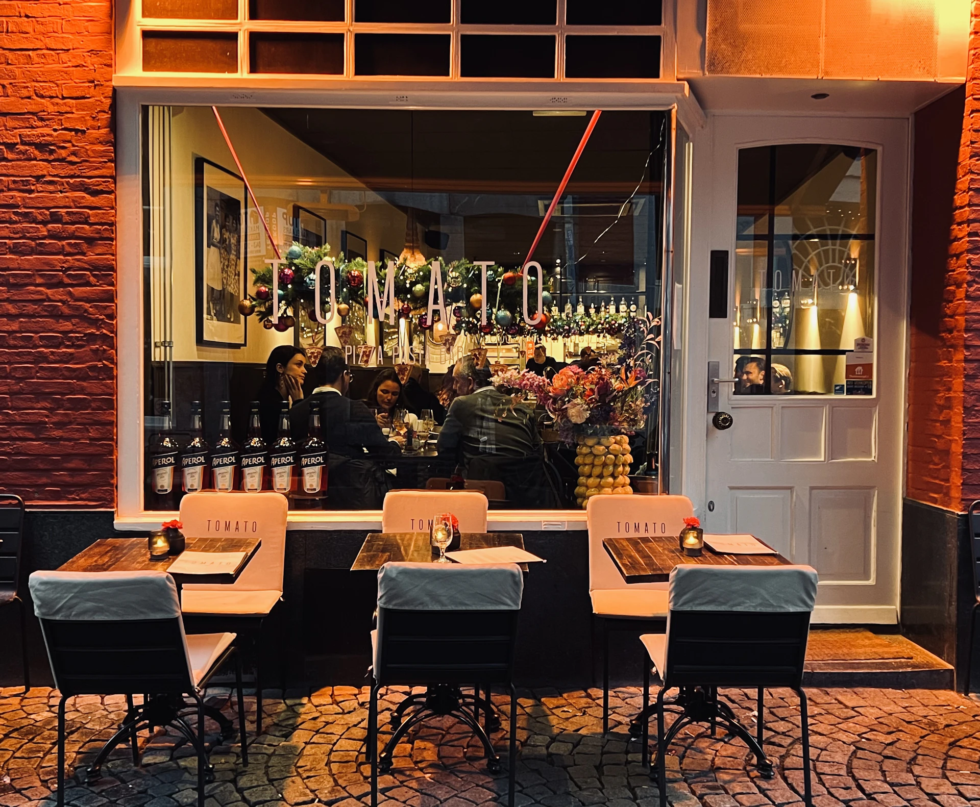 black and brown leather padded tub sofa