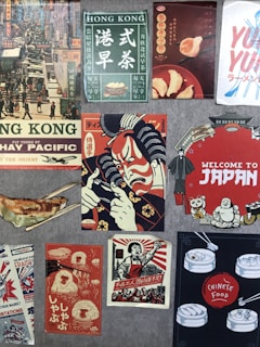 A collage of vintage and retro-style posters featuring various Asian themes. The top left depicts a bustling Hong Kong street scene, while nearby posters advertise drinks and dumplings in vibrant colors. Another central poster displays a samurai in red and blue hues. The bottom right features dim sum illustrations with the label 'Chinese Food'. Elements of Japanese culture, such as a welcome sign with traditional icons, are also present.