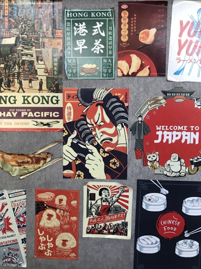 A collage of vintage and retro-style posters featuring various Asian themes. The top left depicts a bustling Hong Kong street scene, while nearby posters advertise drinks and dumplings in vibrant colors. Another central poster displays a samurai in red and blue hues. The bottom right features dim sum illustrations with the label 'Chinese Food'. Elements of Japanese culture, such as a welcome sign with traditional icons, are also present.