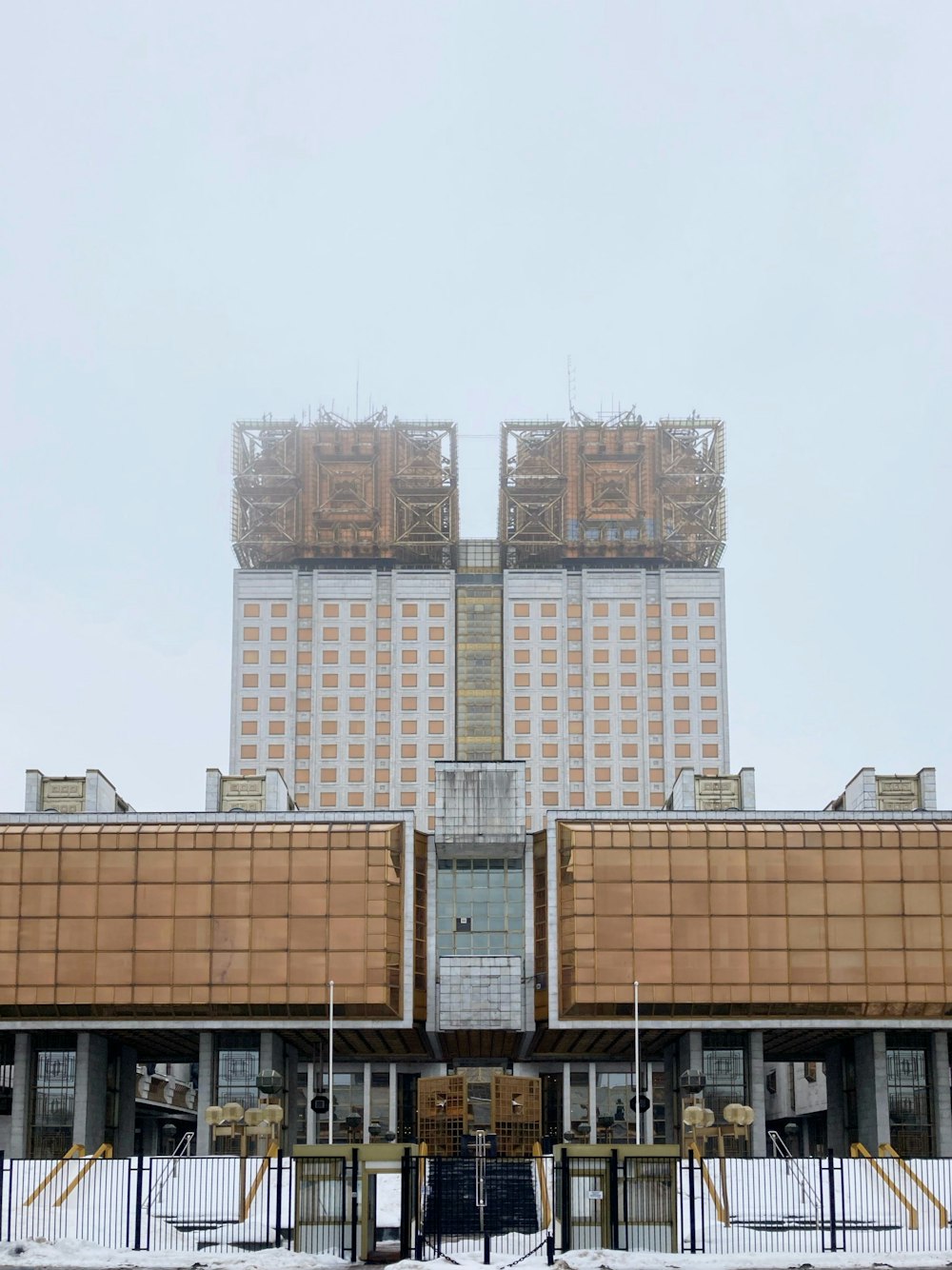 a large building with a lot of windows on top of it