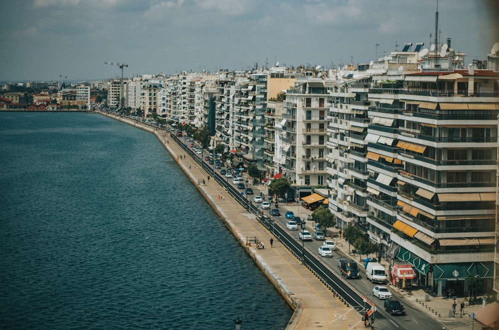 a large body of water next to a city