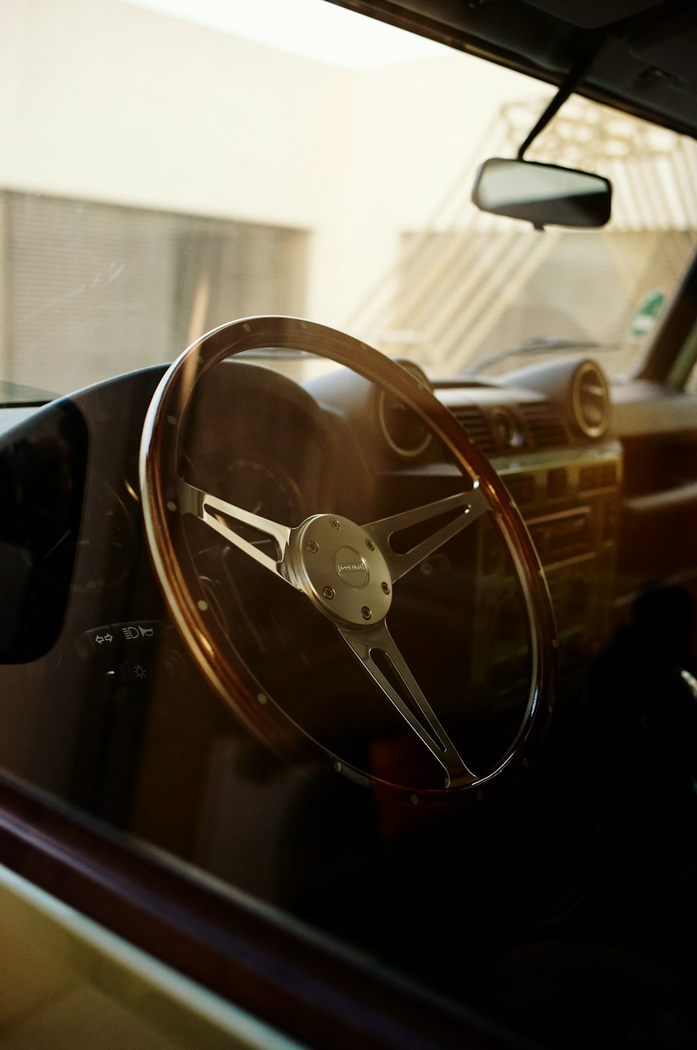 a steering wheel and dashboard of a car