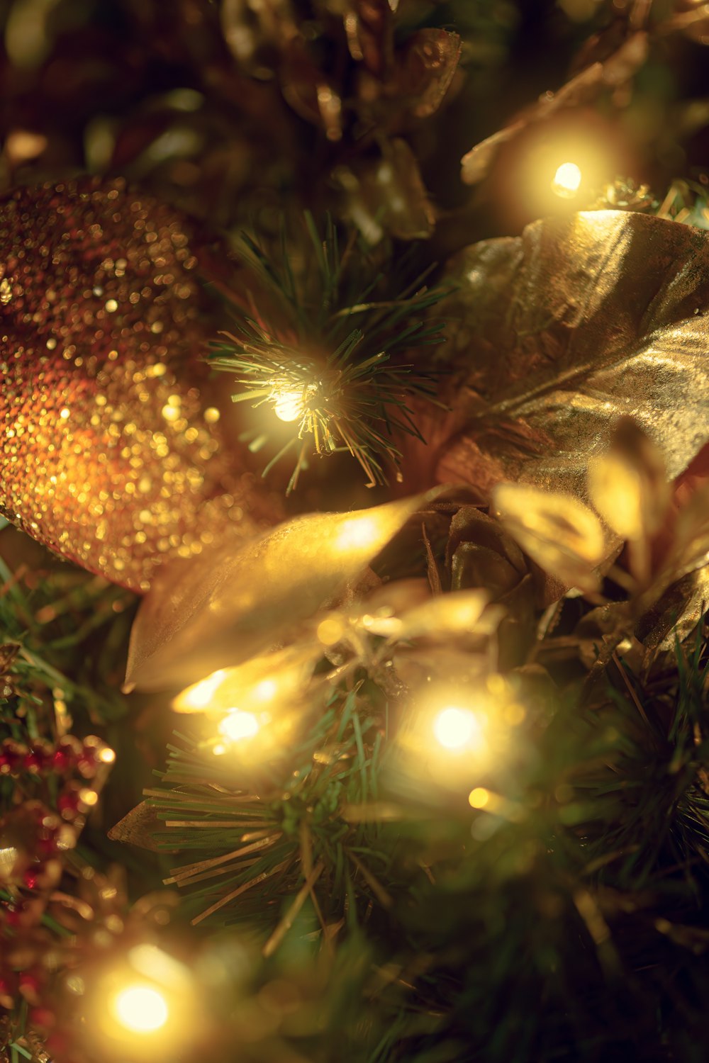 a close up of a christmas tree with lights