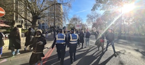 Ambassadors walking through the city, carrying banners with messages of hope.