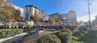 Security staff managing a crowd at a public event.