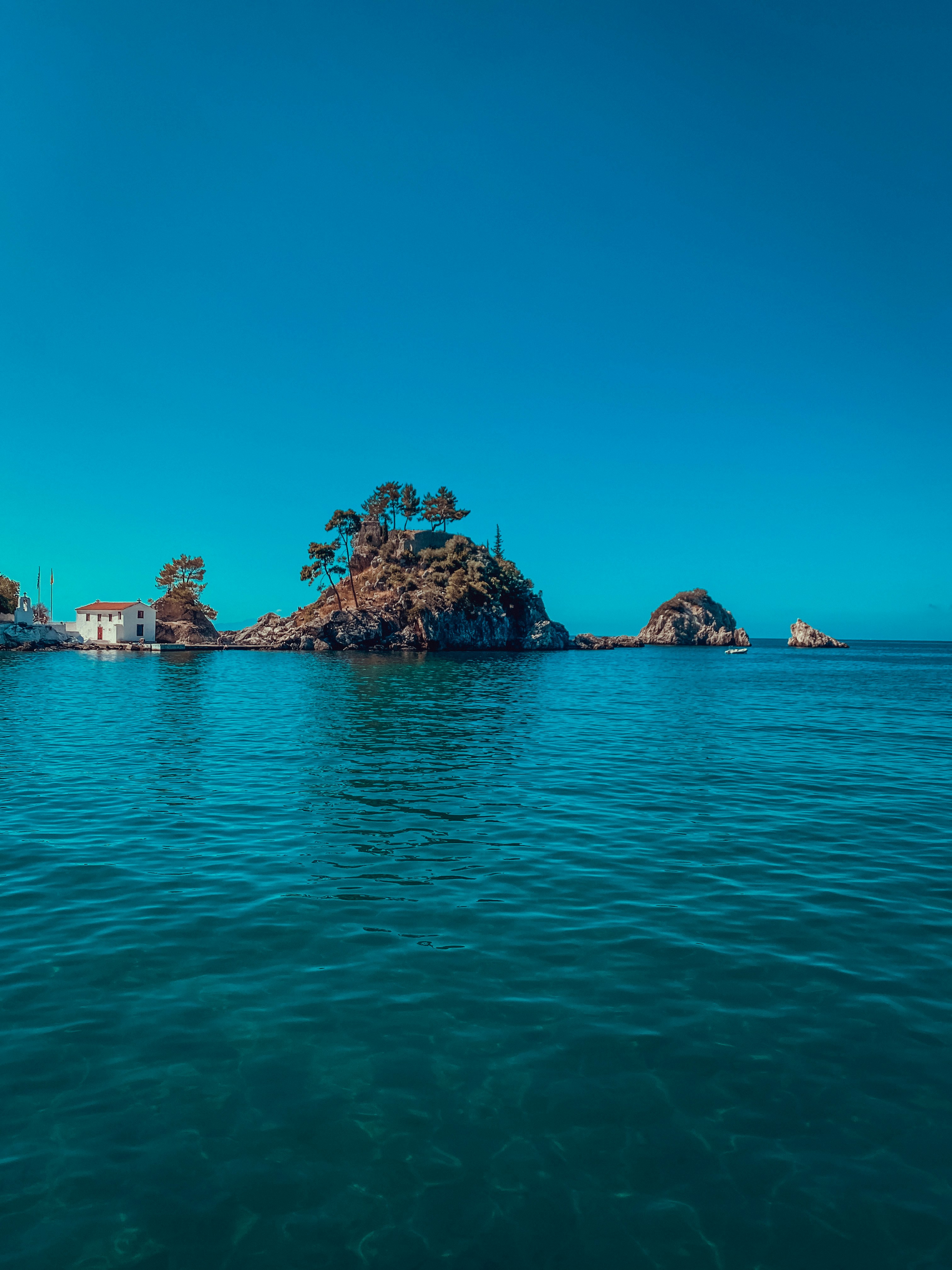 a small island in the middle of a body of water