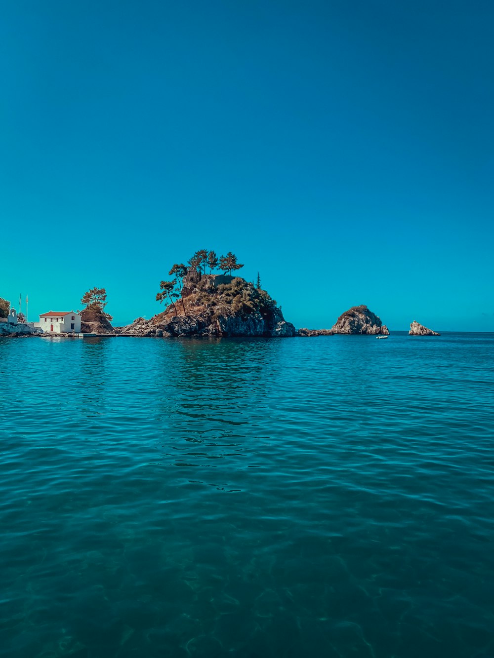 a small island in the middle of a body of water