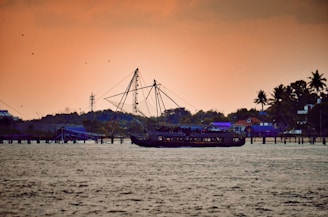 Traditional fishing boats anchored along Tulum's coast.