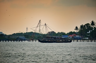 A traditional Maldivian fishing boat at sunrise, symbolizing sustainable and respectful harvesting.