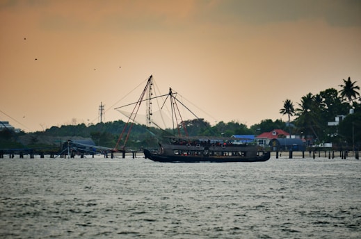 A traditional Maldivian fishing boat at sunrise, symbolizing sustainable and respectful harvesting.