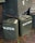 Several army green jerry cans labeled 'WATER' are stacked alongside wooden crates. The crates display text reading 'CORPS OF ENGINEERS' and 'U.S. ARMY SUPPLIES'. The scene is set on a brick pavement with some moss visible between the bricks.