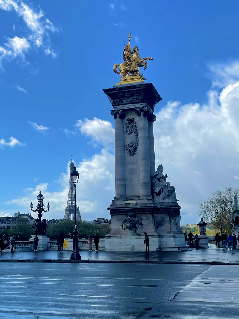 a statue of a man on top of a pillar