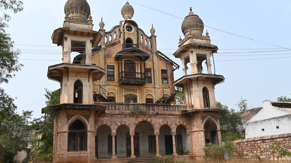 an old building with two towers and a clock