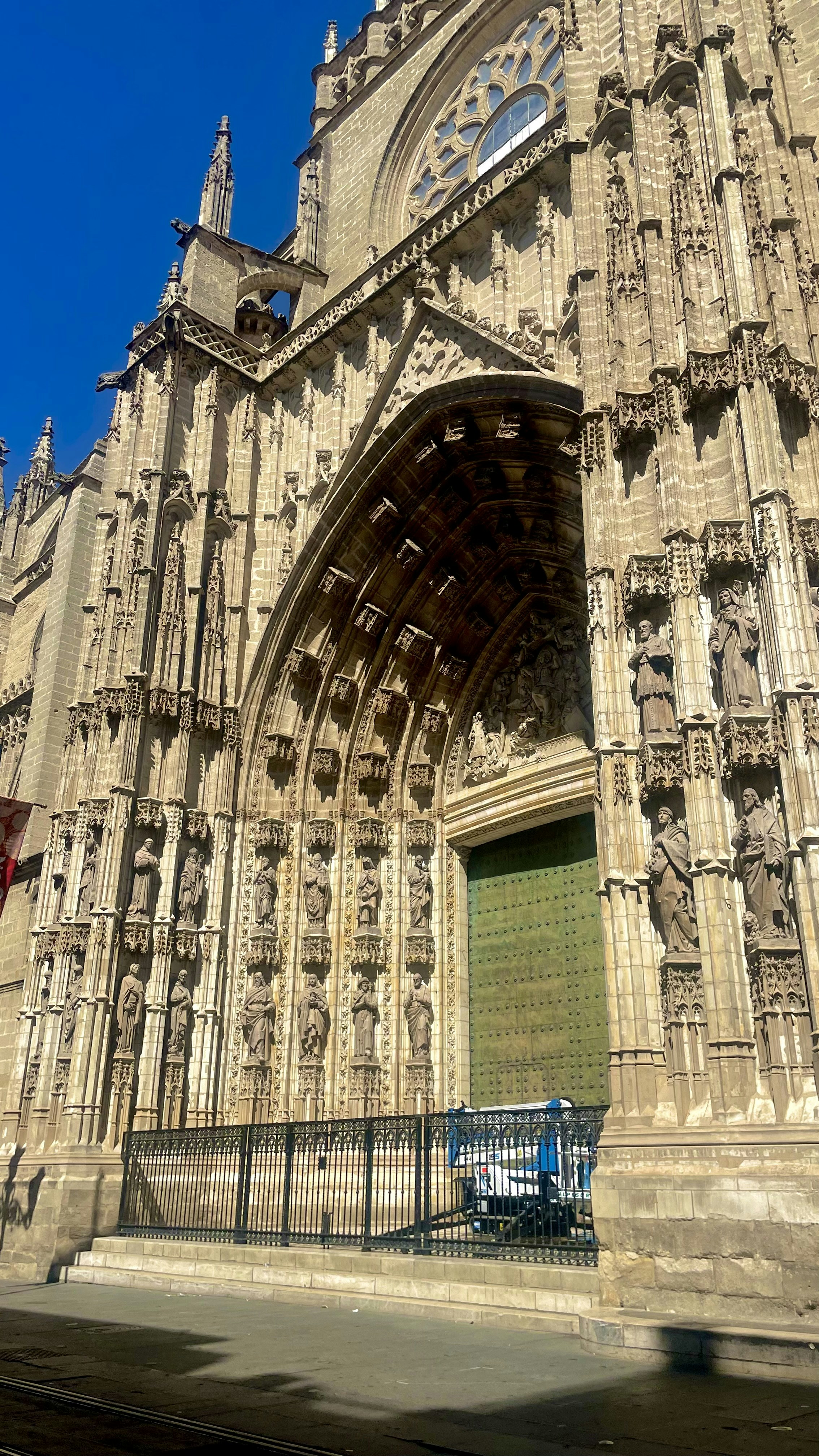 a large cathedral with a clock on the front of it