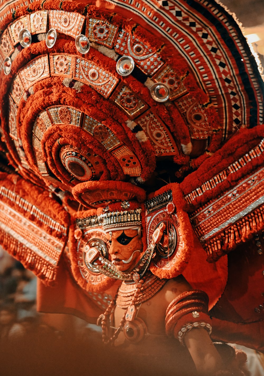 a close up of a person wearing a costume