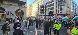 Crowd gathered outside a local police station after a high-profile arrest.