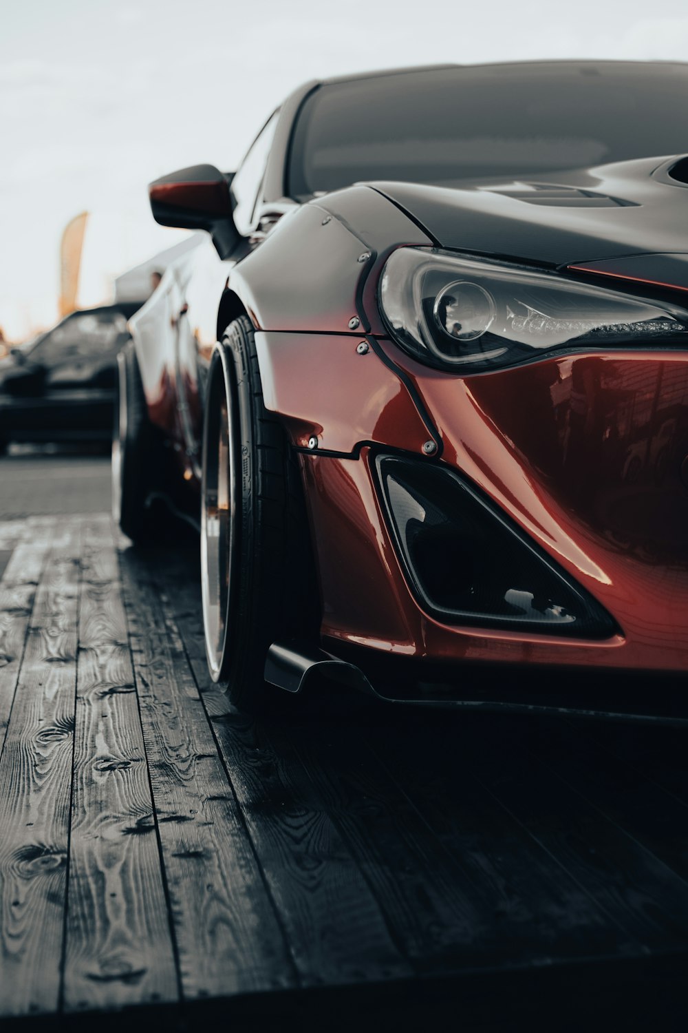 a close up of a red sports car