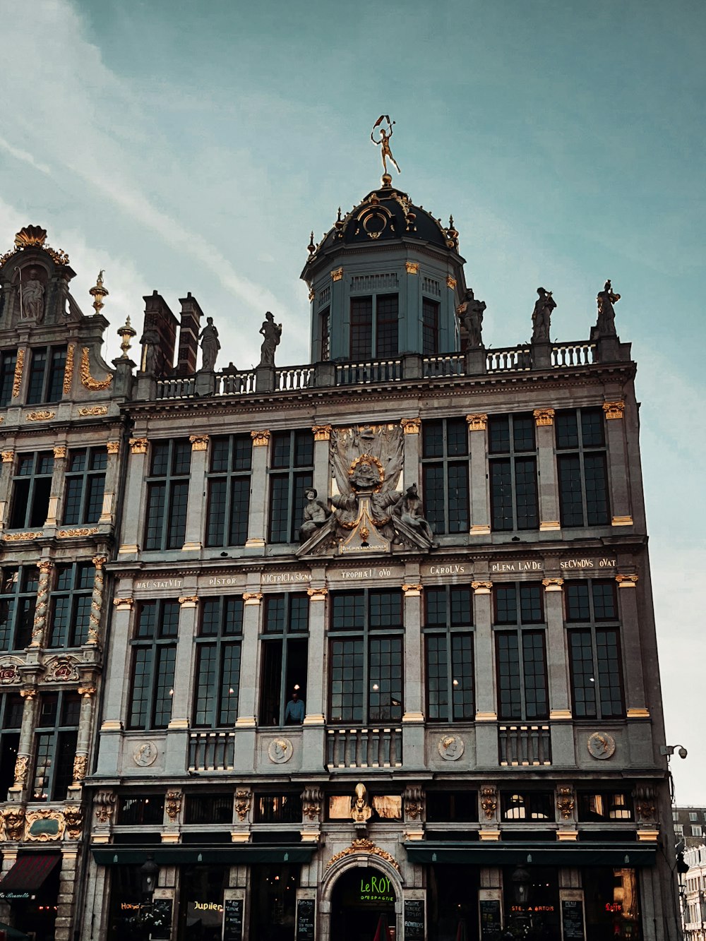 a large building with a clock on the front of it