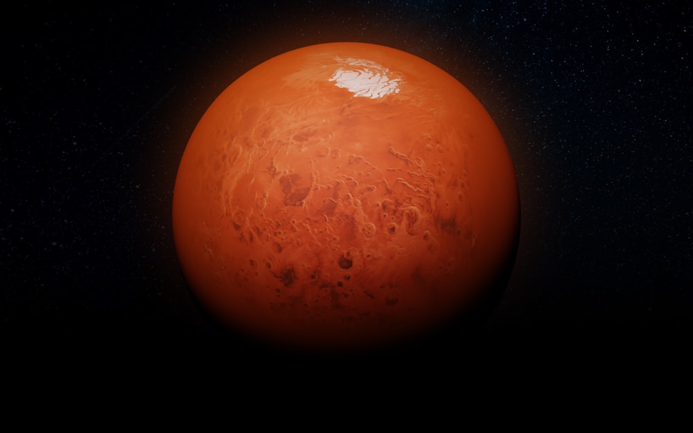 a red planet with a star in the background