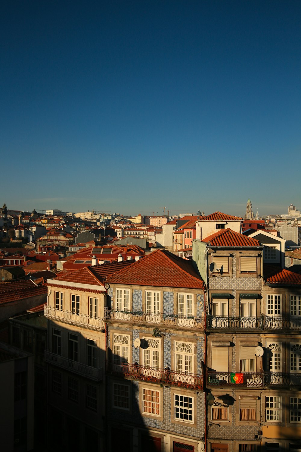 a view of a city from the top of a building