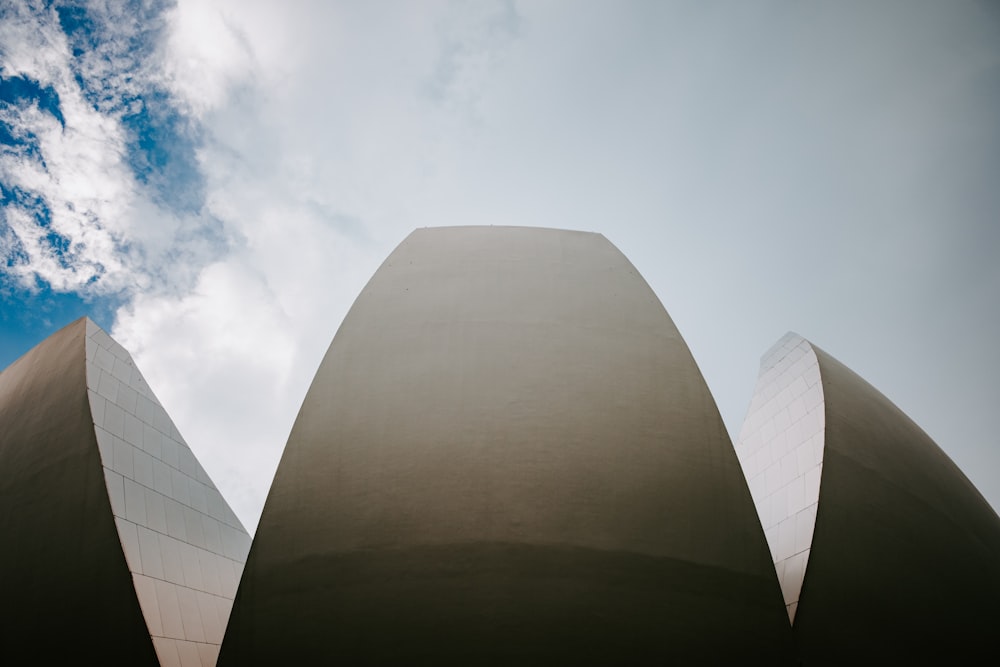 a view of the top of a building from the ground