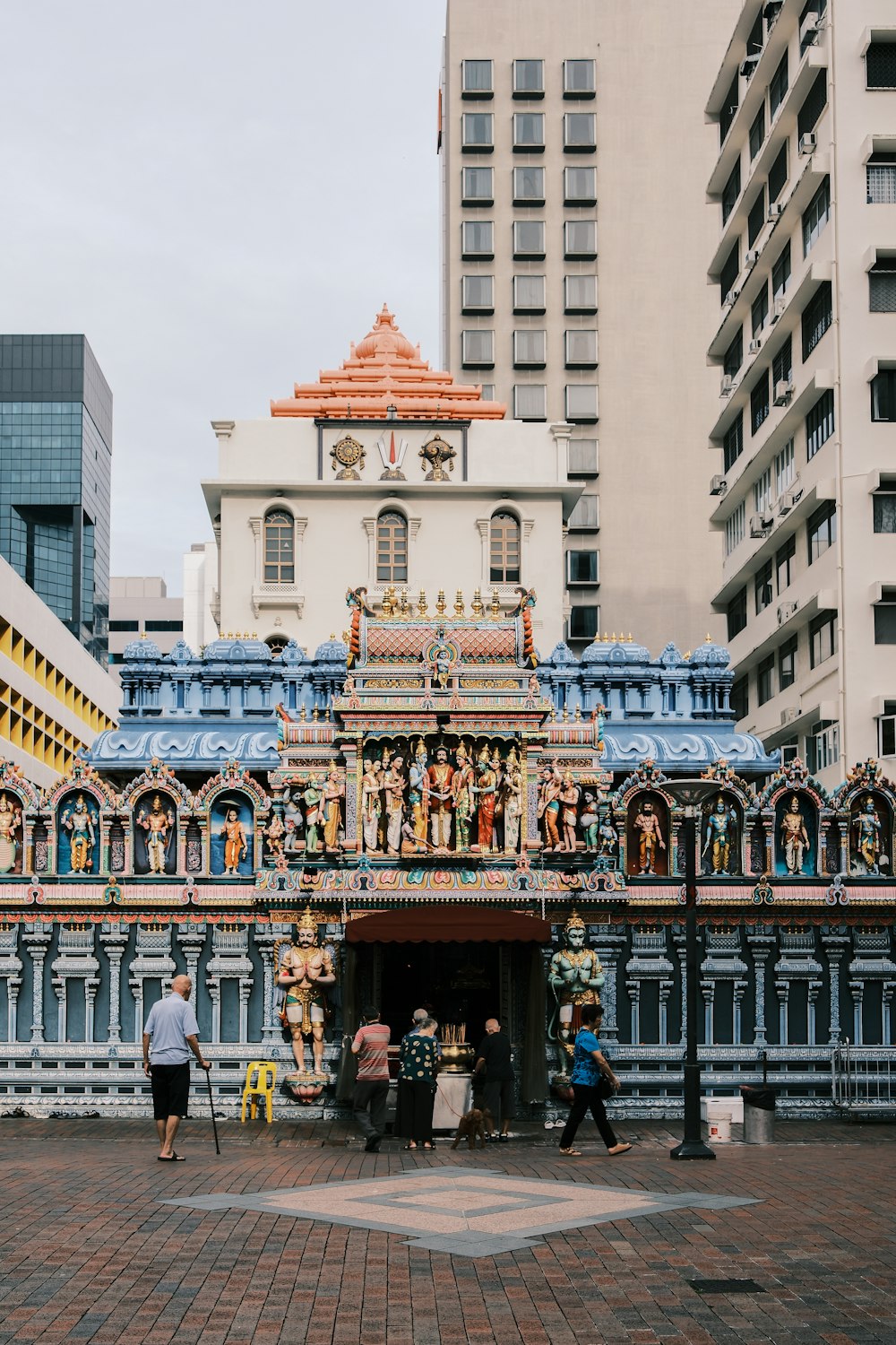 a group of people standing in front of a building