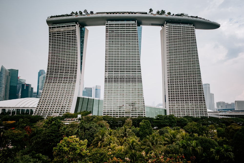 a couple of tall buildings in the middle of a city