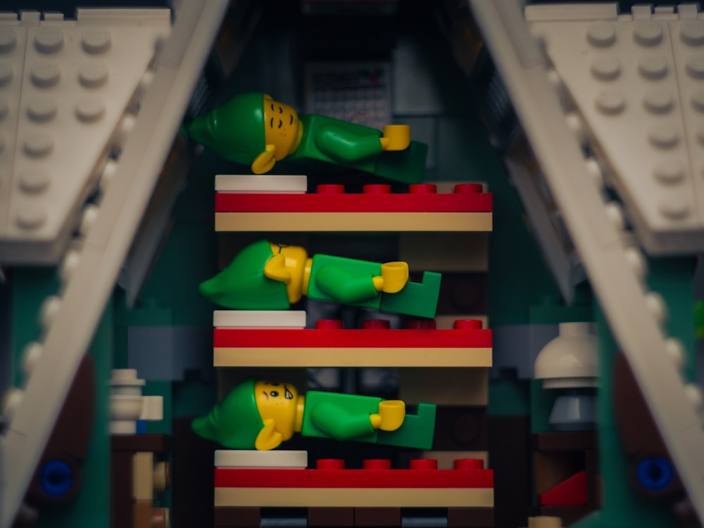 a close up of a shelf with legos on it
