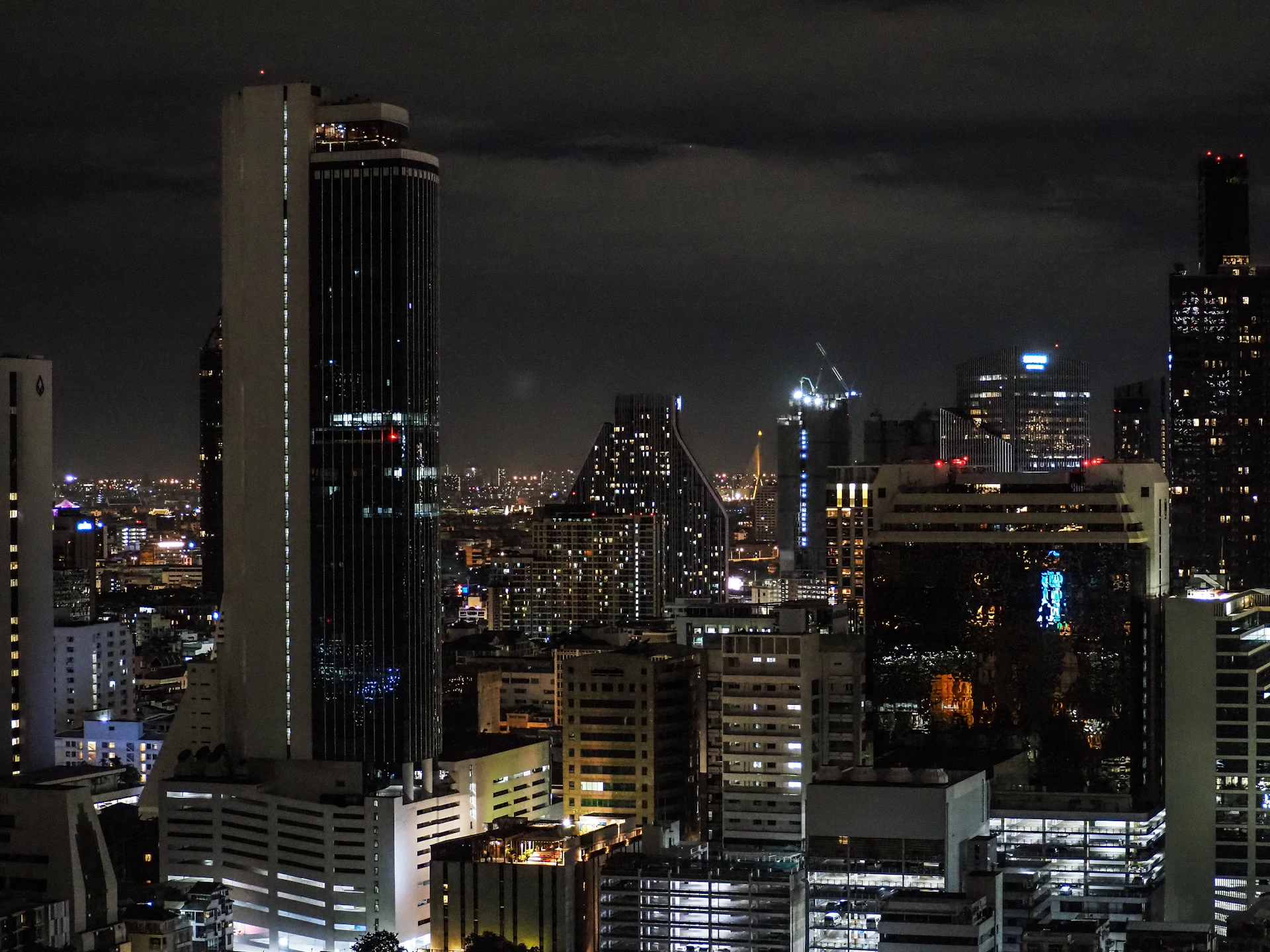 woman wearing yellow long-sleeved dress under white clouds and blue sky during daytime