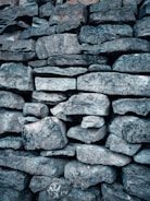Close-up of rough construction stones stacked on a truck bed