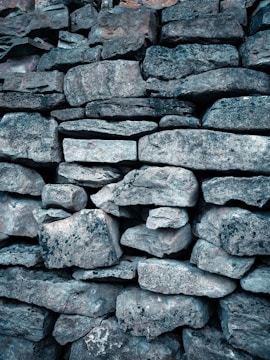 Close-up of rough construction stones stacked on a truck bed