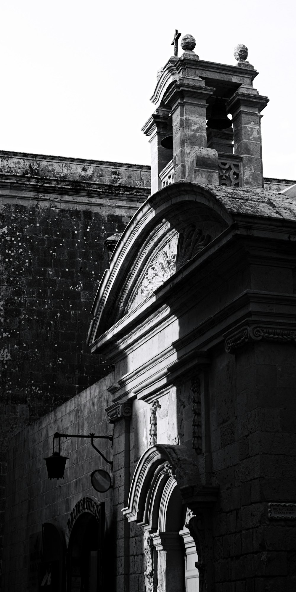 a black and white photo of a clock tower