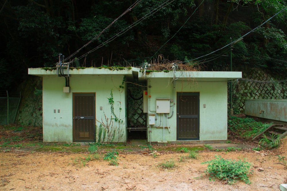 a couple of small buildings sitting next to each other